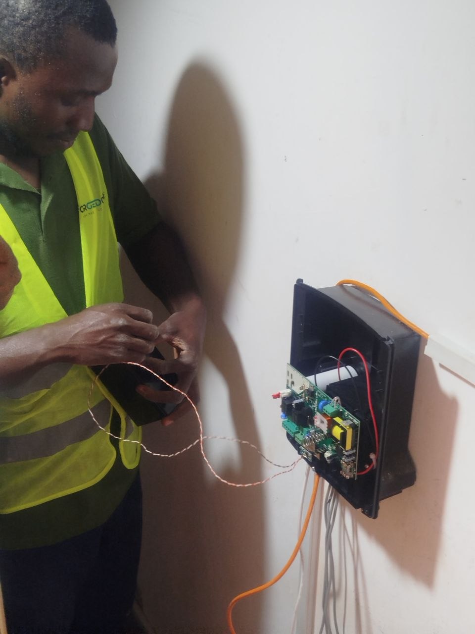 Installing electric fence conductors across the wall
