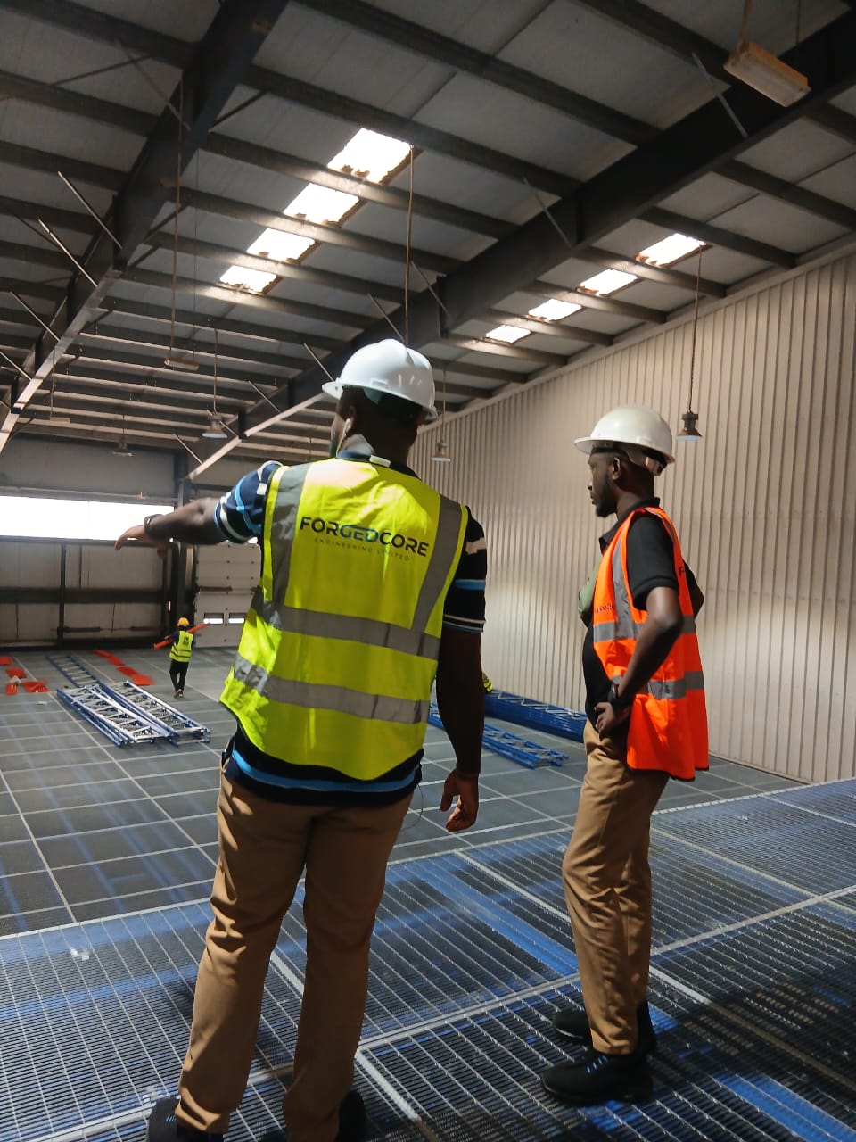 Forgedcore engineers supervising work inside an industrial facility